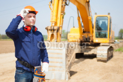 Man_at_work_in_a_construction_site.jpg